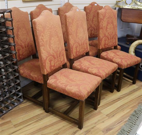 A set of 7 oak dining chairs